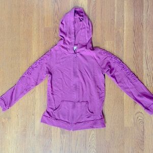 Zippered hoodie with distressed design and lace sleeve overlay. Never worn Sz 14